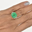 Octagon Emerald Ring with Diamond Trapezoids