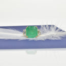 Octagon Emerald Ring with Diamond Trapezoids