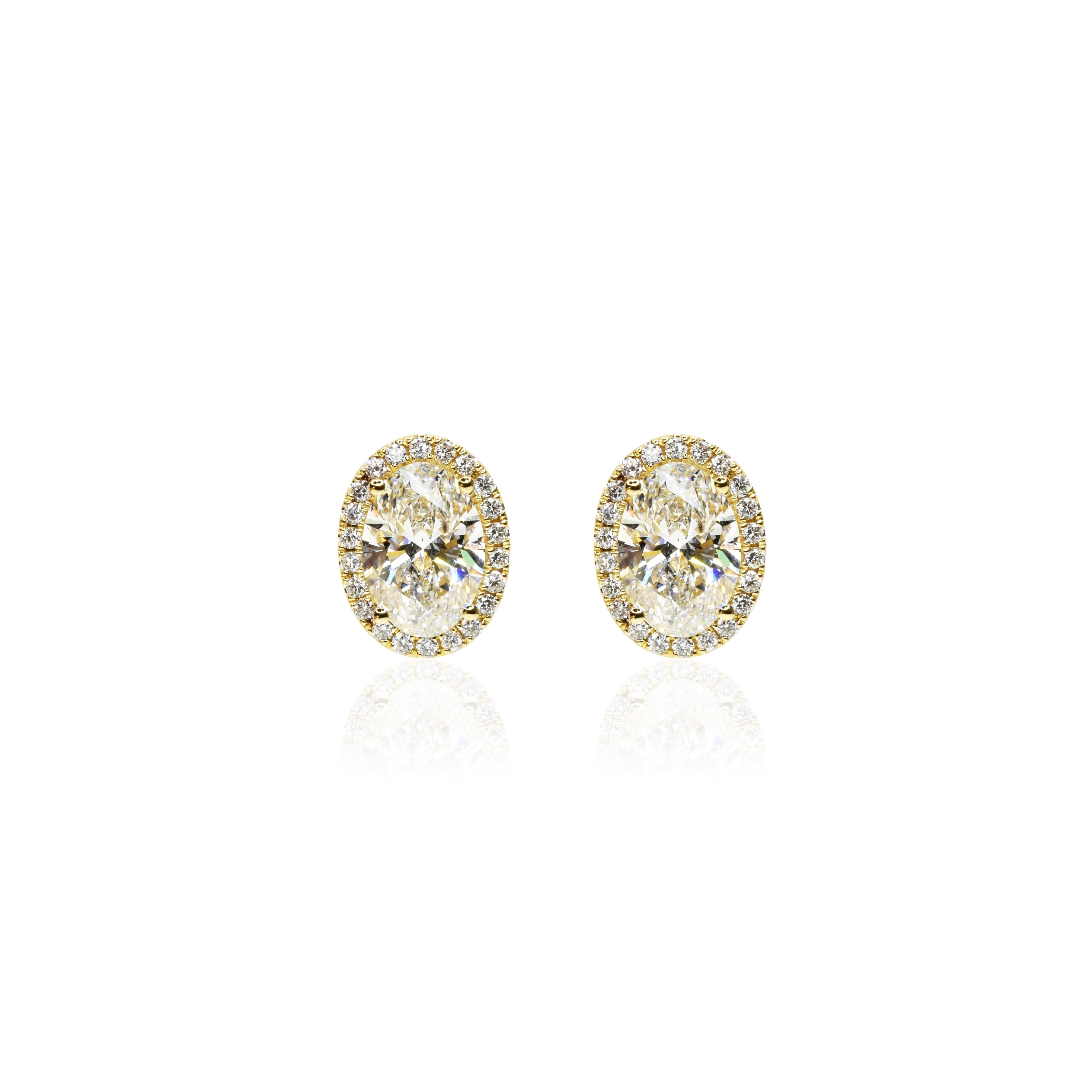Oval Shaped Diamond Earrings with Halo