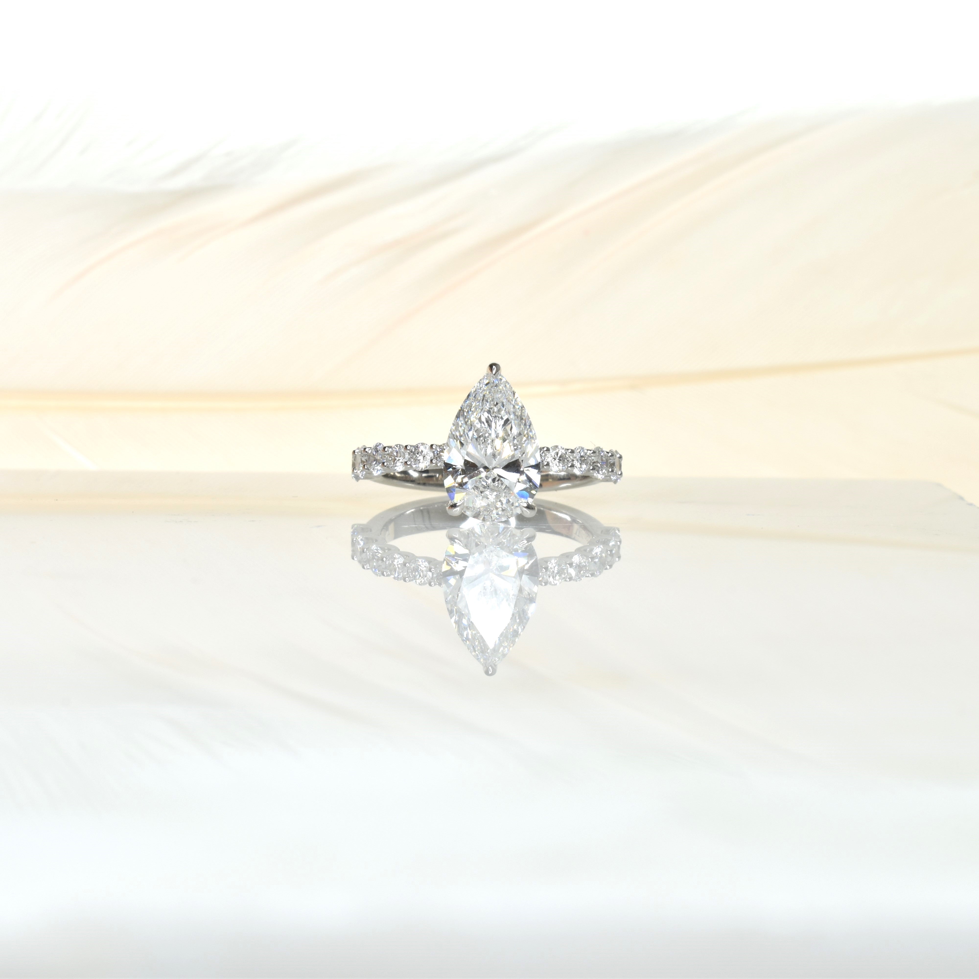 Pear Shaped Diamond Engagement Ring with Tapered band