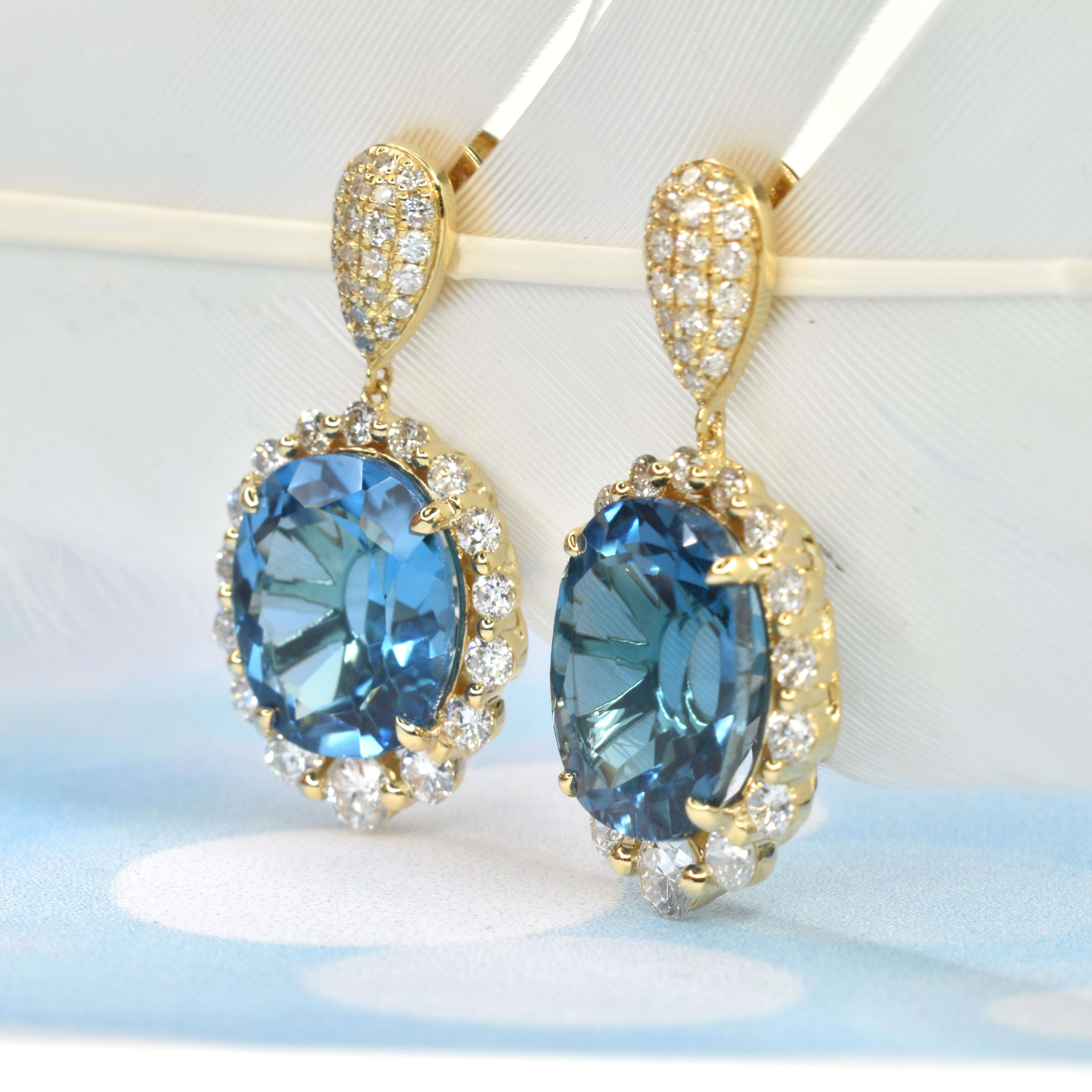 Oval Blue Topaz with Diamond Halo Earrings