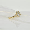 Oval Diamond Ring with Pear Diamonds on Shoulder