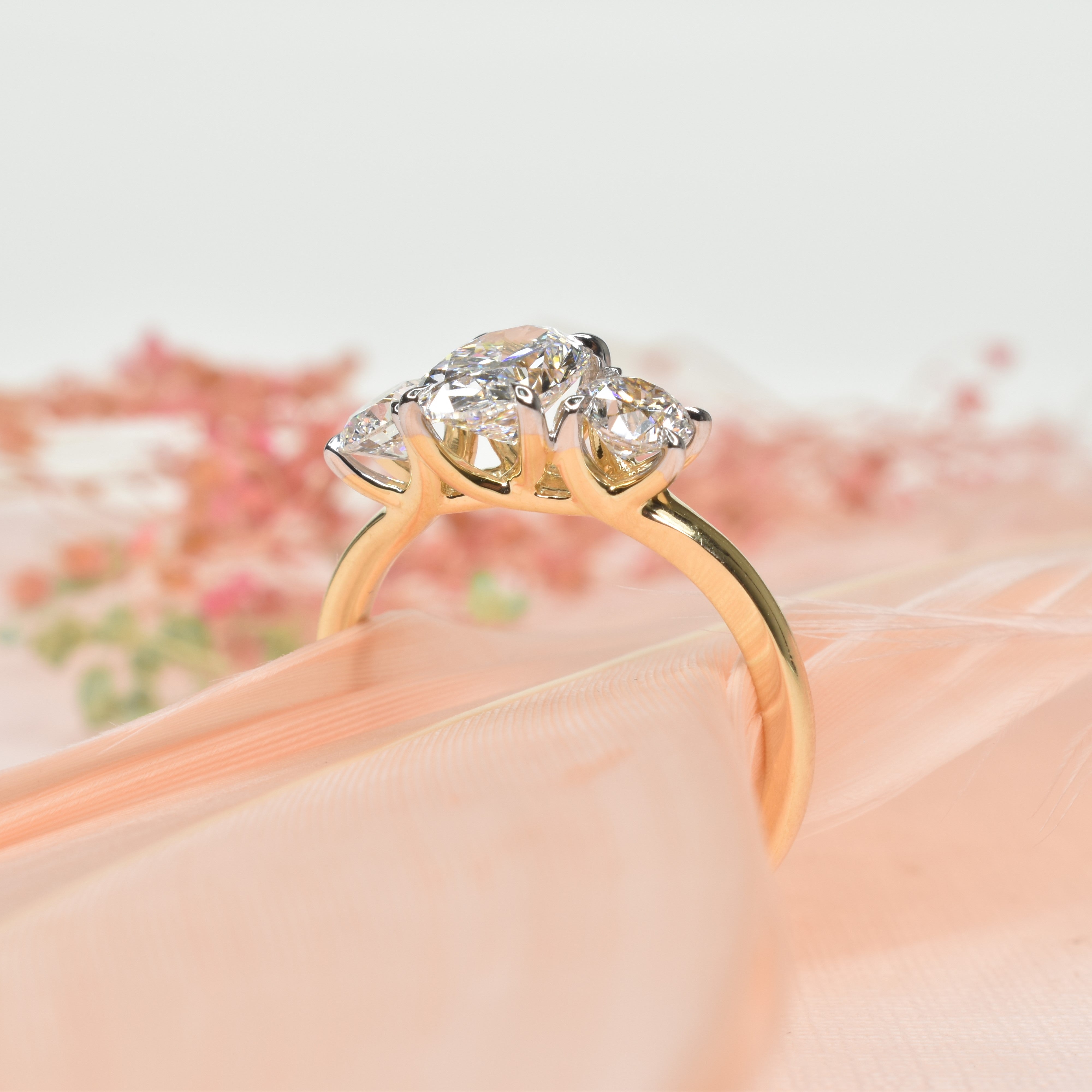Oval Trilogy Ring with Round Diamonds