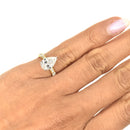 Pear Shaped Diamond Engagement Ring with a Graduated Band