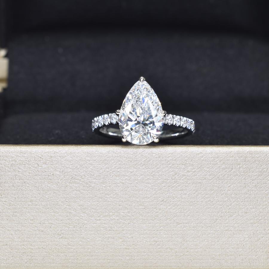 2ct Pear Shaped Diamond Ring with Diamond Band