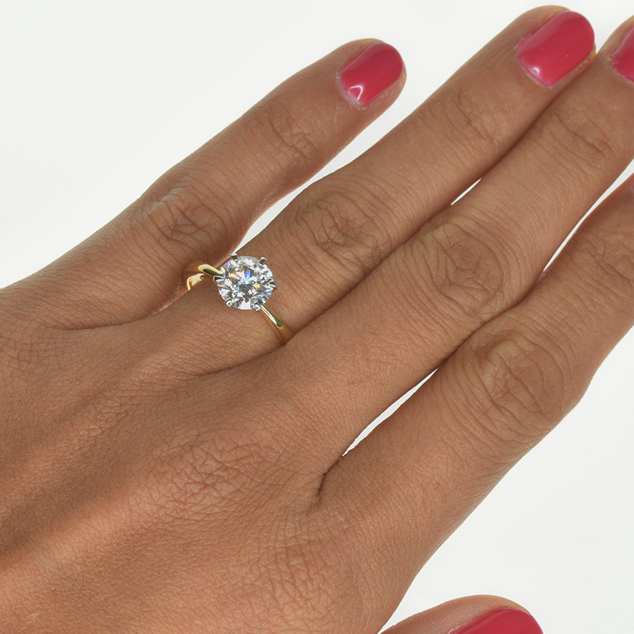 Classic Round Diamond Ring with a Tapered Band