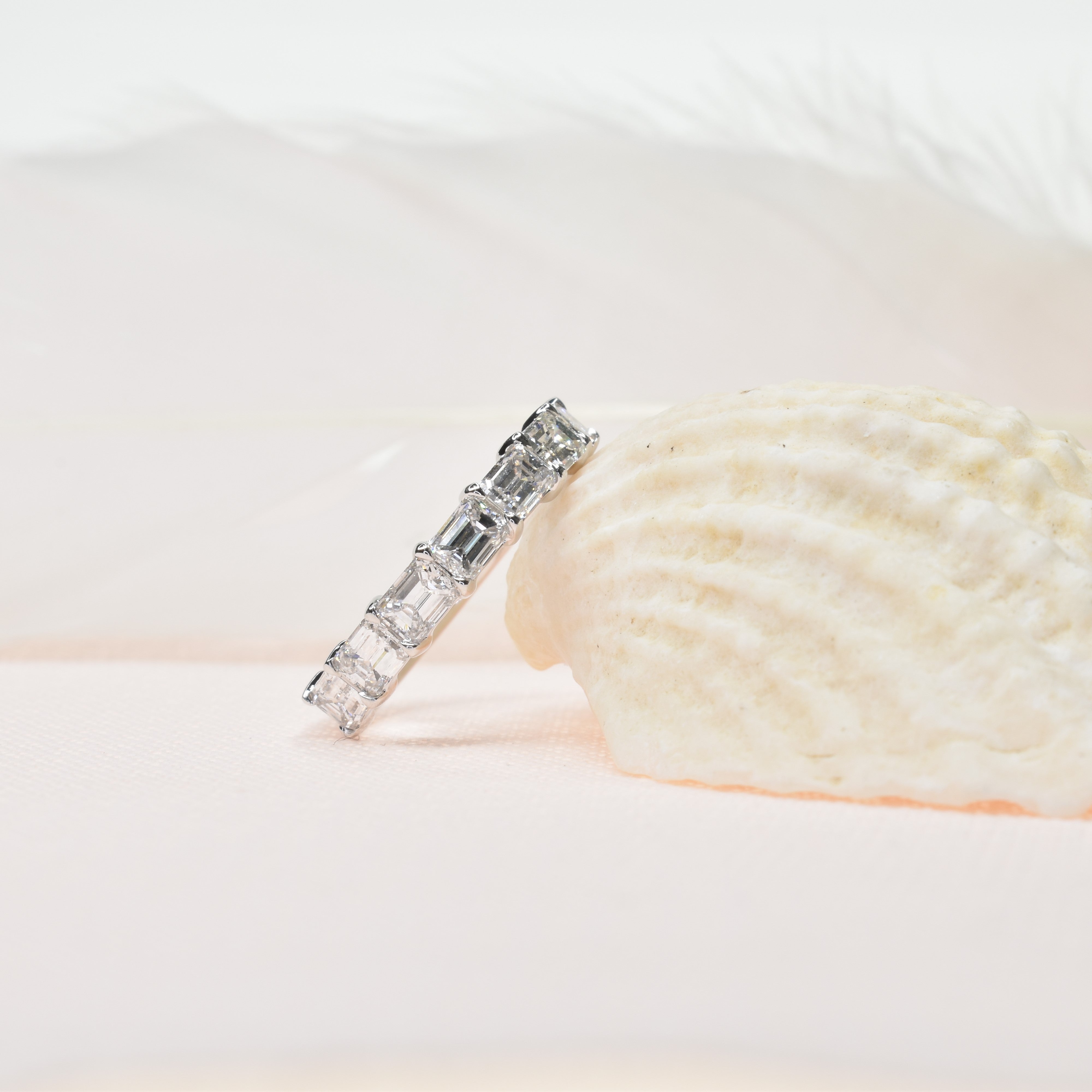 Sideways Set Emerald Cut Diamond Half Eternity Ring